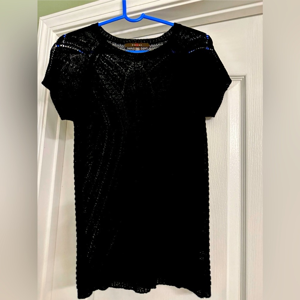 Black mesh sweater. Great with a tank top under. Never worn.